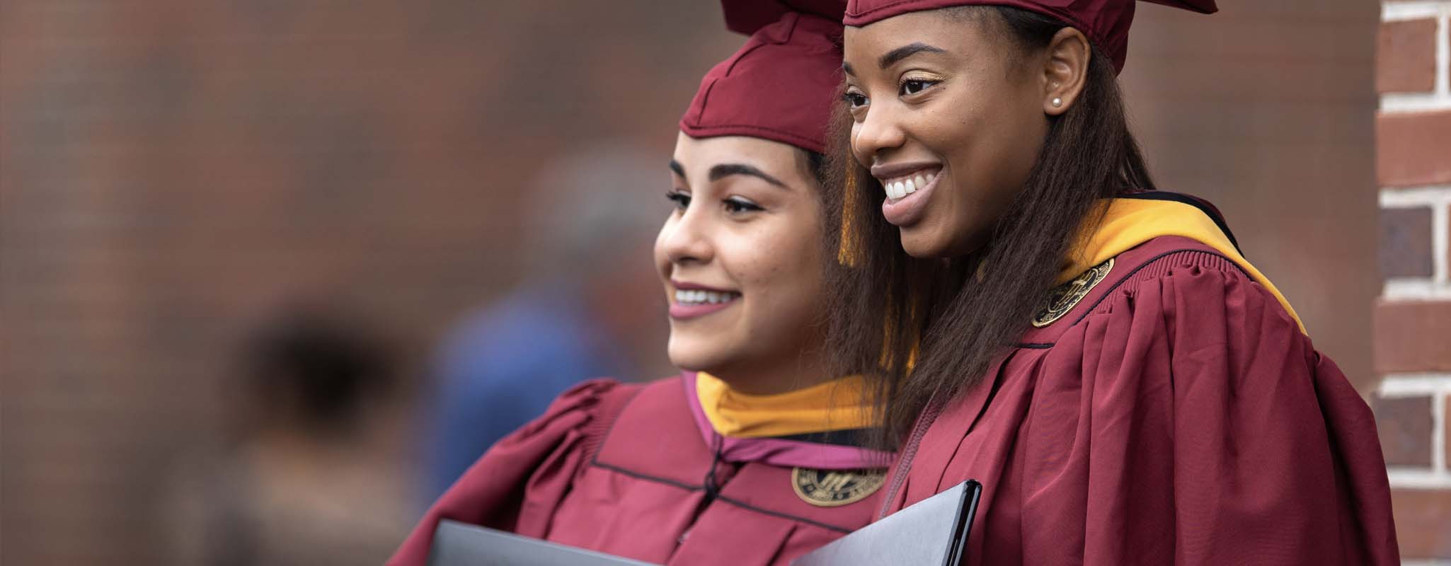 Two FSU students graduating.
